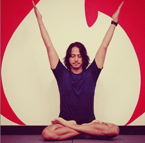 Vikram “Vik” Hirani, yoga and meditation instructor, in a kriya (one of the yogic actions), to lift the spirit