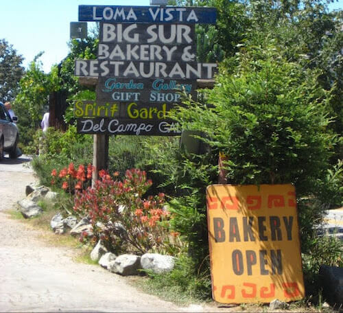 The sign for Big Sur Bakery & Restaurant among other businesses as you pass it on Highway 1 on the way to Esalen